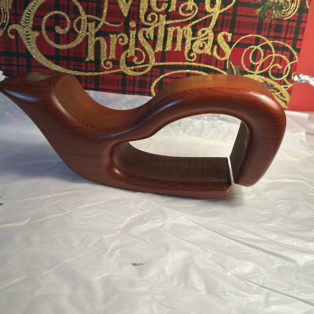 Red wood hand carved whale from California